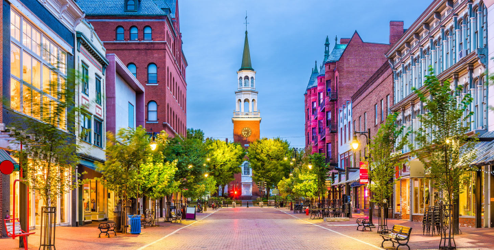 Quiet street view of Burlington, VT with golden light around the street